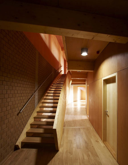 slunakov-by-projektil-architekti-staircase-and-adobe-wall-in.jpg