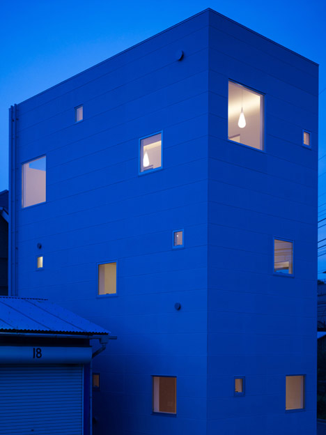 Small House with big Spiral Staircase by Hideshi Abe