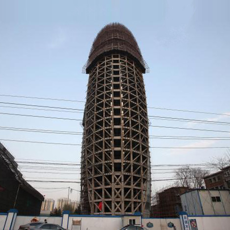 Chinese newspaper headquarters compared to huge penis