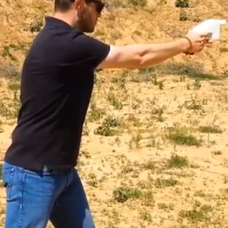 Cody Wilson firing the first 3D-printed gun.