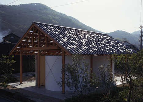 Hut with the Arc Wall by Tato Architects
