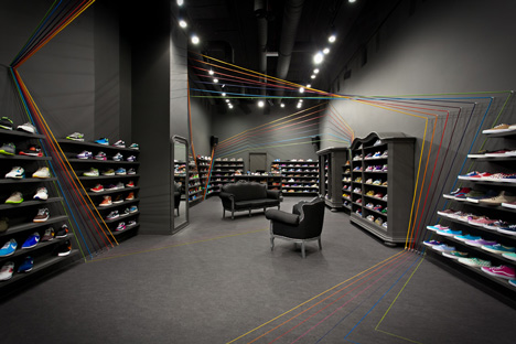 Run Colors trainers store by Modelina Architekci