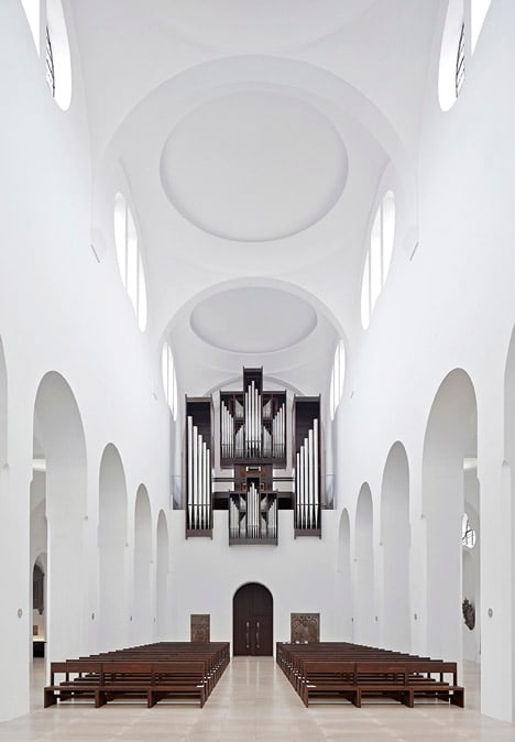 John Pawson's minimal St Moritz Church photographed during a choir rehearsal