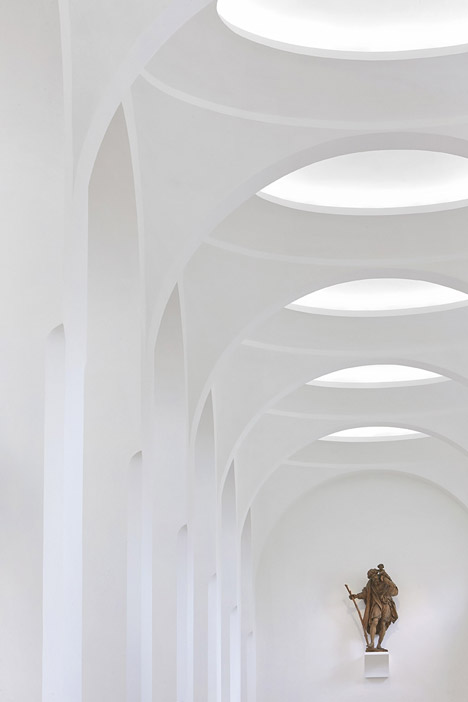 John Pawson's minimal St Moritz Church photographed during a choir rehearsal
