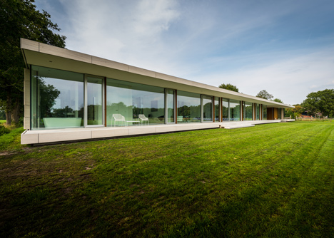 Dutch studio Inbo hides a transparent house behind a grove of trees