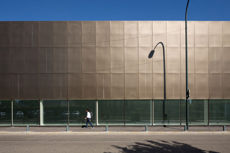 Parisian sports hall by Ateliers O-S Architectes with bands of light on its walls 