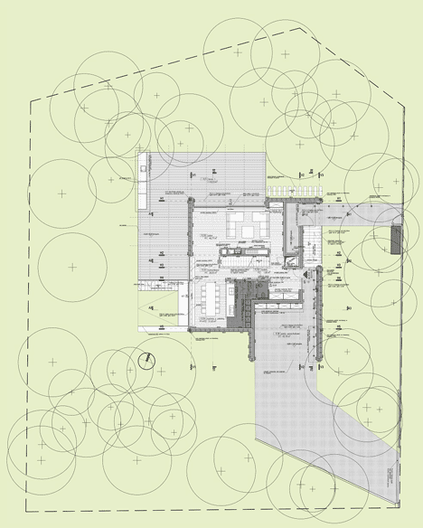 Site plan of Timber-clad seaside house with a grainy concrete interior by Ultra Architects 