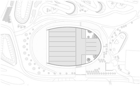 Site plan of Sports centre clad with sun-bleached wooden slats by Explorations Architecture