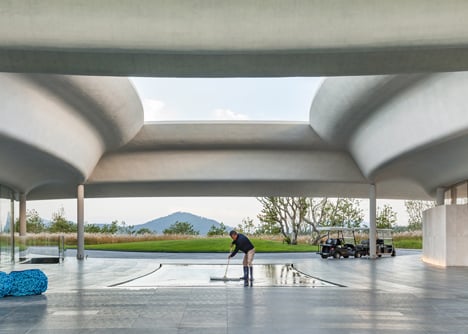 Southcape golf clubhouse by Mass Studies features curving concrete canopies