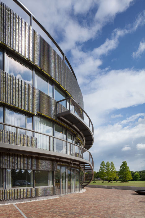 Ecological university building by BDG Architects features a cylindrical facade