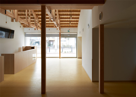 O Pharmacy by Ninkipen! features exposed wooden ceiling