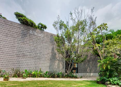 Perforated concrete walls encase La Tallera gallery by Frida Escobedo