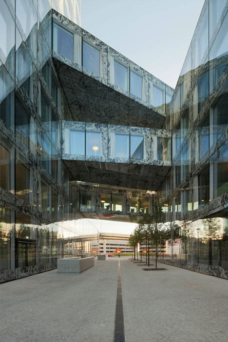 Allianz Headquarters by Wiel Arets features glass fritted to resemble Mies' Barcelona Pavilion