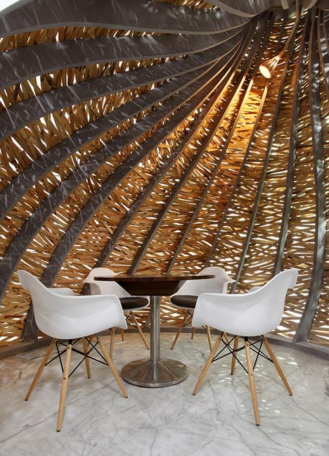 Giant timber nest provides meeting room at Baya Park offices by Planet 3 Studios