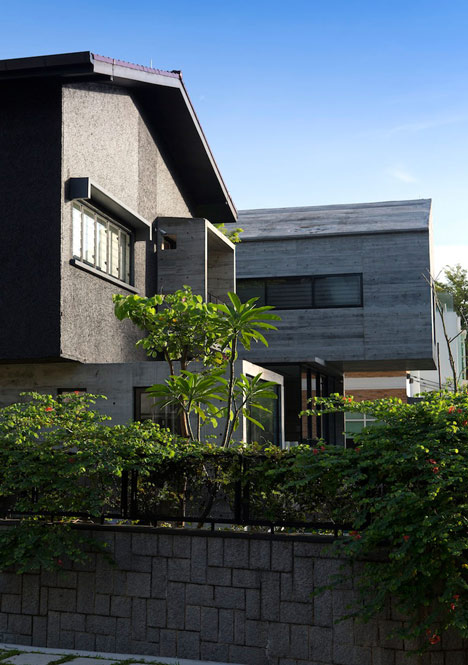 Formwerkz Architects house extension features cantilevered concrete box
