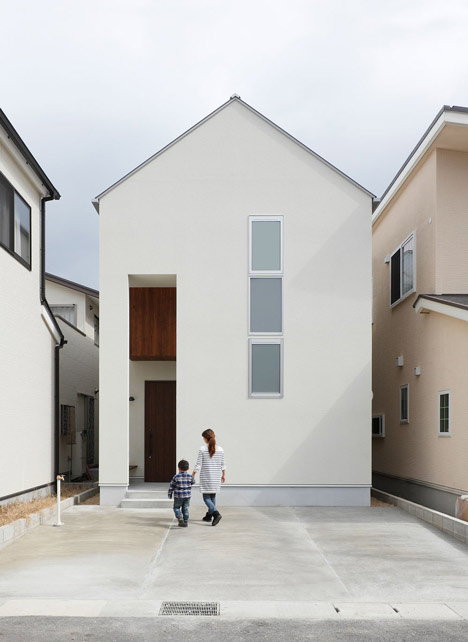 House-shaped doorways puncture Hazukashi House by Alts Design Office