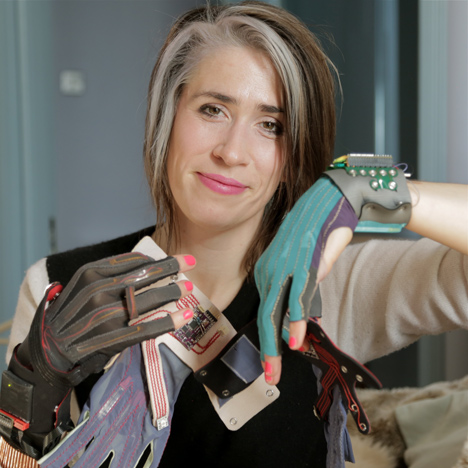Imogen Heap portrait with Mi.Mu gloves