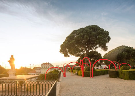 Luminous red arches by LIKEarchitects installed at Portuguese palace