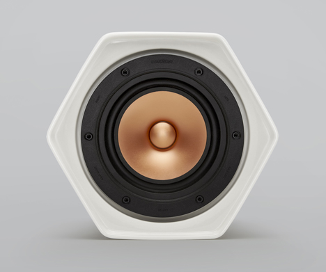 Wireless hexagonal ceramic speaker connects to others by rolling over