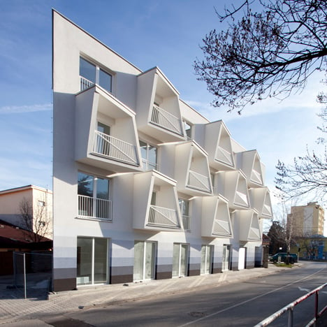 Angular balconies stretch towards sunlight at North Star Apartments by Nice Architects
