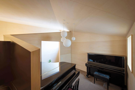 Piano House by NI&Co. Architects offers a secluded spot for making music