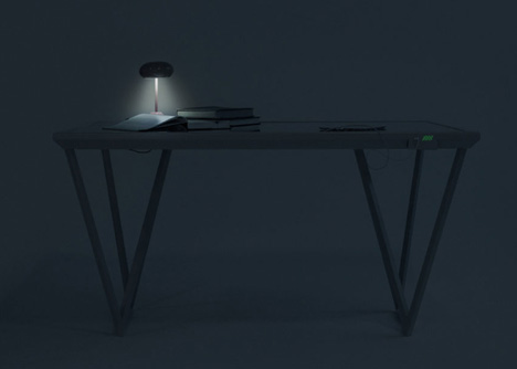 The Current Table by Marjan van Aubel features a solar panel for charging mobile phones