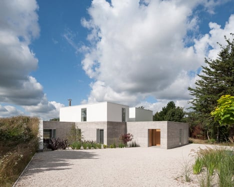 The two-storey house, which replaces a poorly extended home on the site, was designed for a woman with two children, who shares the property with her ... - Broombank-house-in-Suffolk-by-SOUP-Architects_dezeen_468_17