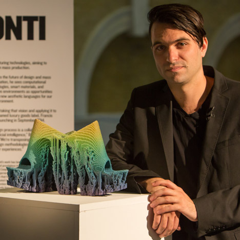 Francis Bitonti with his pair of shoes that were 3D-printed with gradients of colour