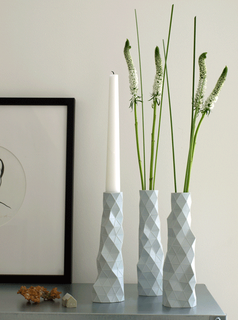 This image and main: Dual-function Faceture bud vase/candleholders are available in white, dark grey, mid grey, pink, mint, blue