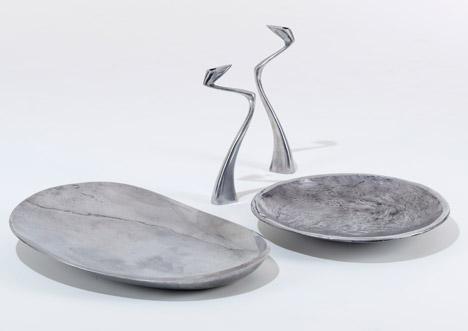 Metalware bowls and Swan candlesticks by Matthew Hilton