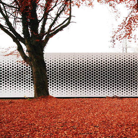 Office with a perforated metal facade by Format Elf