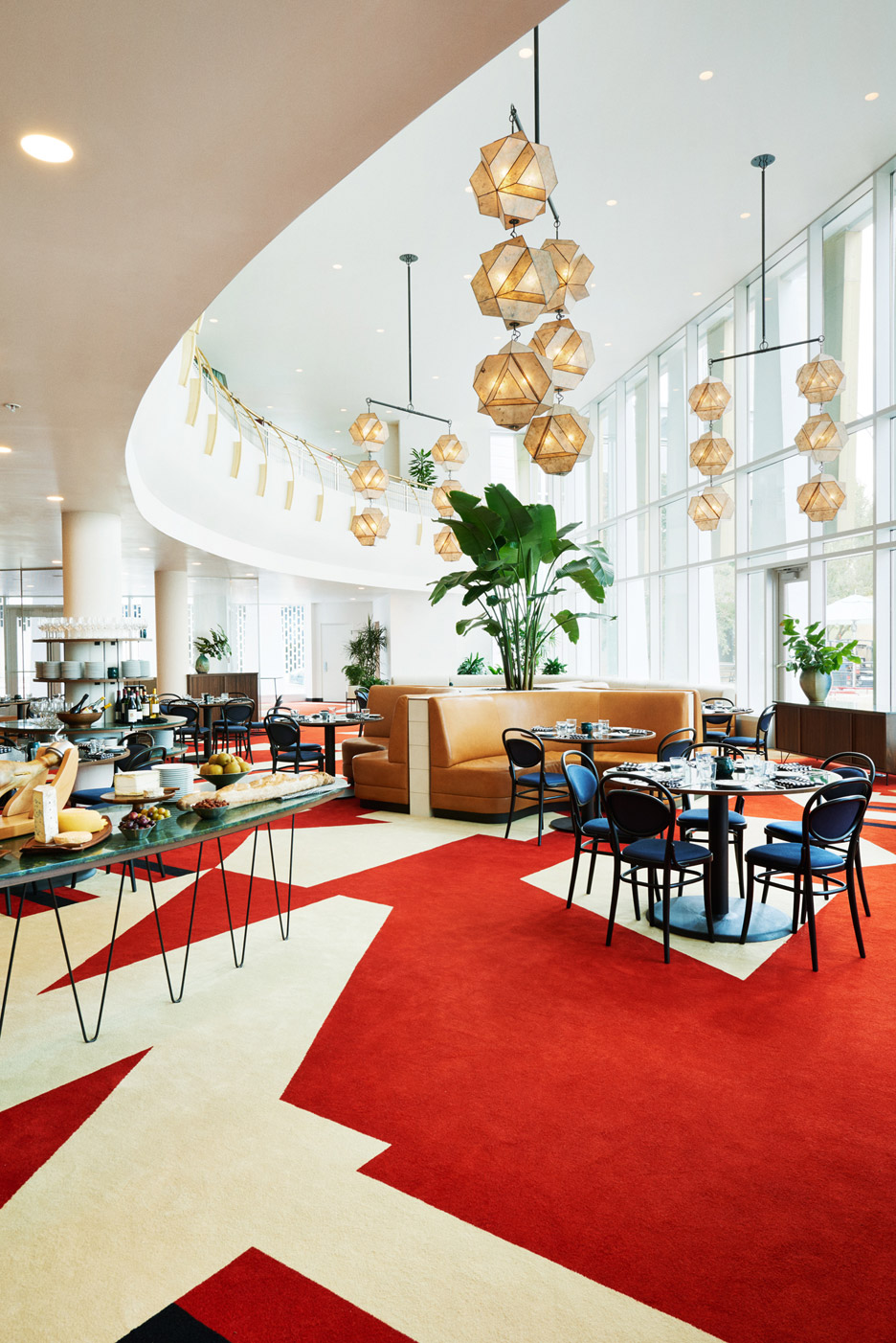 Commune Converts 1960s Space Age Style Bank Into A Hotel In