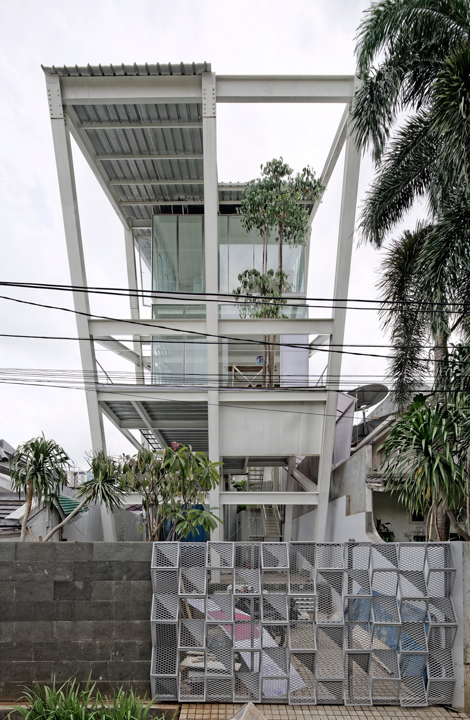 Rumah Miring by Budi Pradono Architects