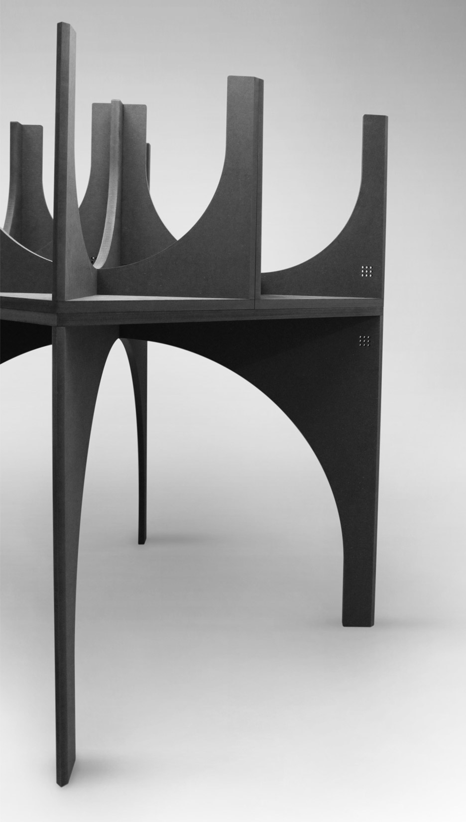Table and stools based on architectural cross vaults by Graft Object