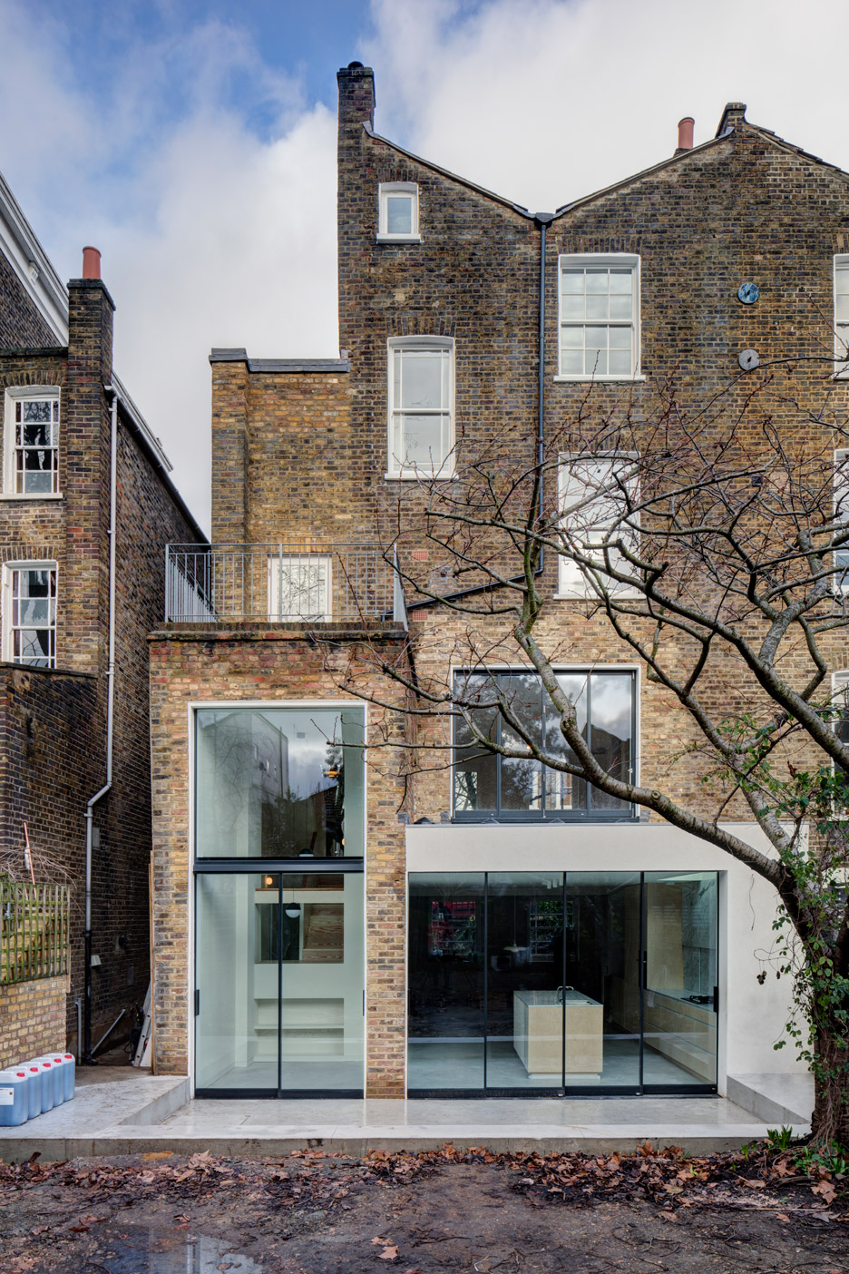 APA creates warehouse-inspired interior for refurbished London townhouse
