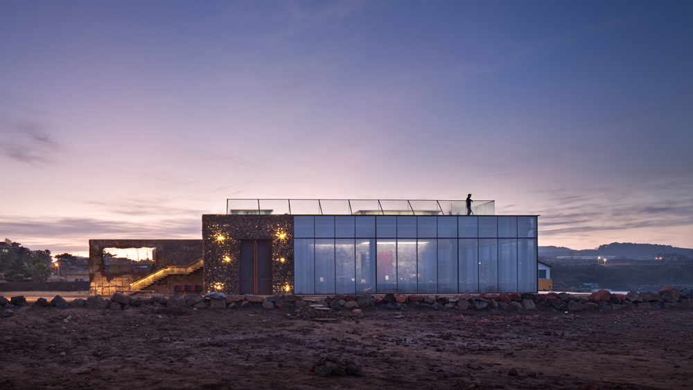 Platform_a completes cafe on Jeju's coast with volcanic stone