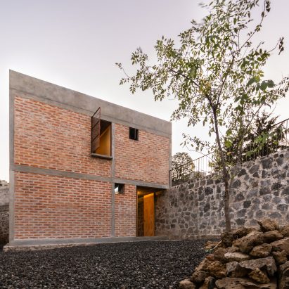 Escobedo Soliz wraps brick house for retired teacher around a patio