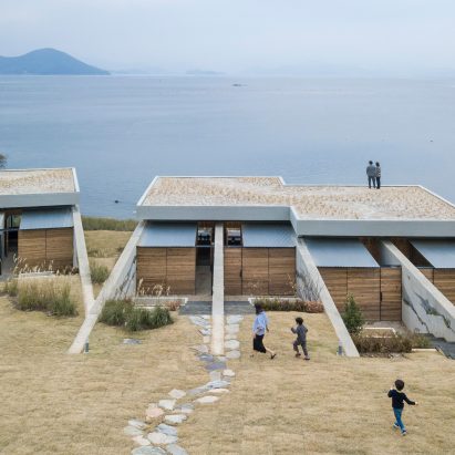 BCHO Architects merges seaside guesthouse with the landscape