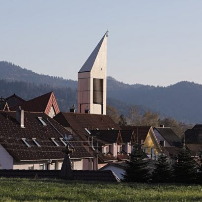 Architektur3 adds triangular timber tower to Black Forest church