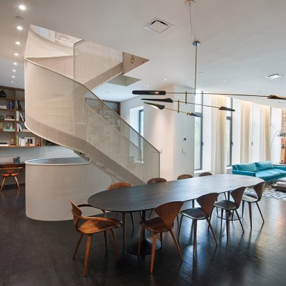 WORKac adds curving perforated steel staircase to Brooklyn apartment