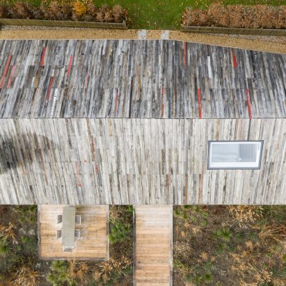 Pad Studio clads house in Hampshire with reclaimed timber from old barn