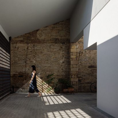 Pema Studio designs home in Portugal as "a dense and closed fortress"