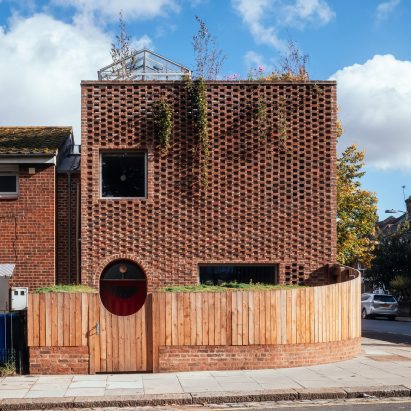 Surman Weston self-builds "characterful family home" with three gardens in London