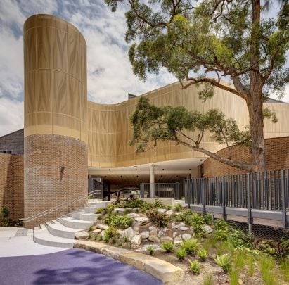 Fjcstudio wraps Sydney school in perforated aluminium facade