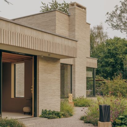 House of EM draws on mid-century design principles for brick-clad home