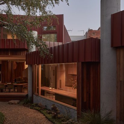 MRTN Architects extends Melbourne home with cluster of red-brick volumes