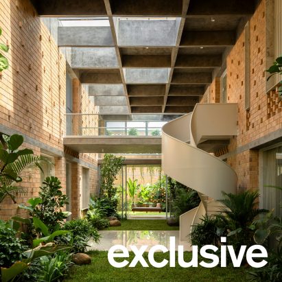 Perforated brickwork wraps courtyard home in India by Spacefiction Studio