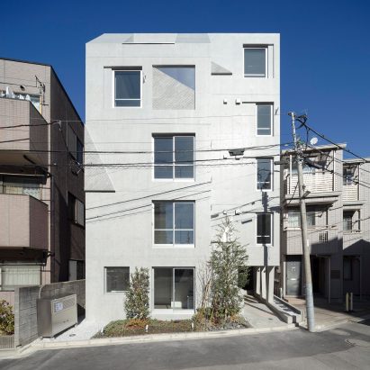 Ryuichi Sasaki Architecture uses trapezoid motifs for concrete housing in Tokyo