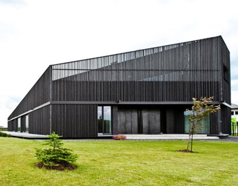 House in Marupe by Open AD