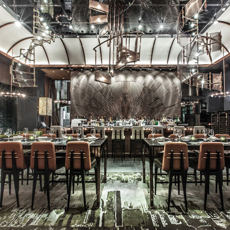 Hong Kong museum restaurant by Joyce Wang features "spiral staircase" chandeliers